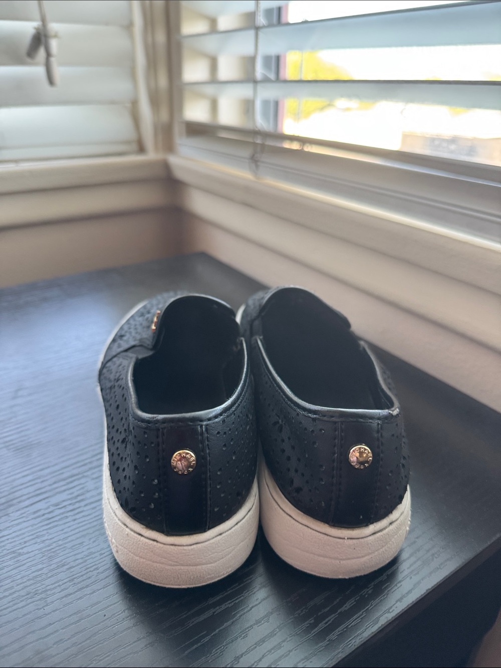 Michael Kors Black Slip-On Sneakers with Gold Logo Accent